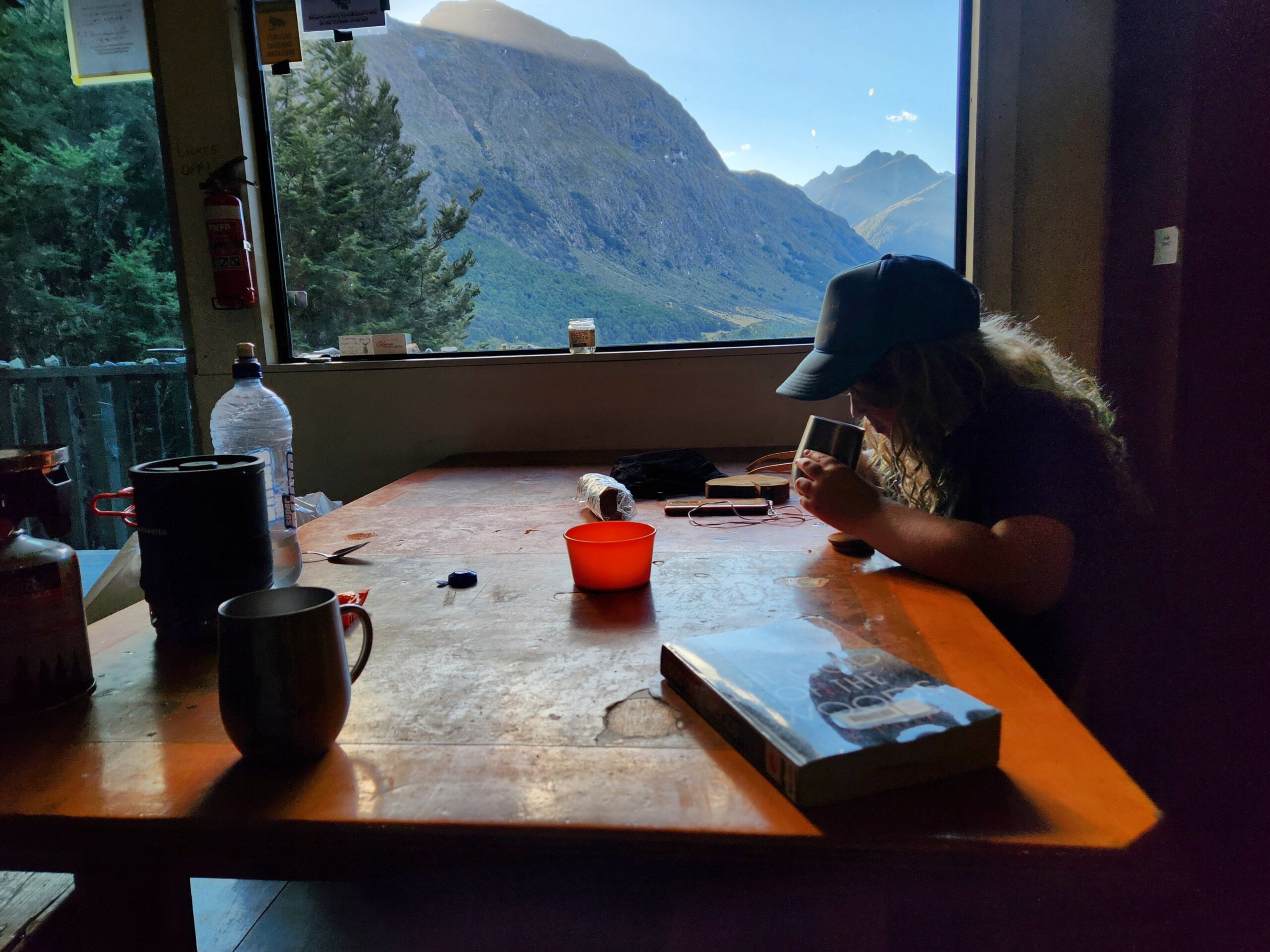 202502 Time for a cuppa in the NZDA Mid-Greenstone Hut – credit Erin Willson
